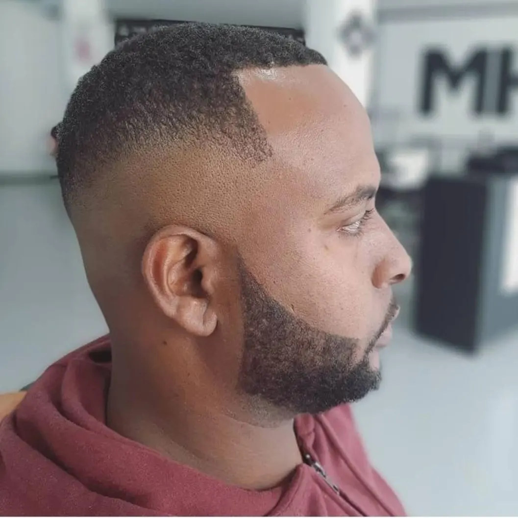 Fade con degradado y barba definida — Wilmer's Barber Shop